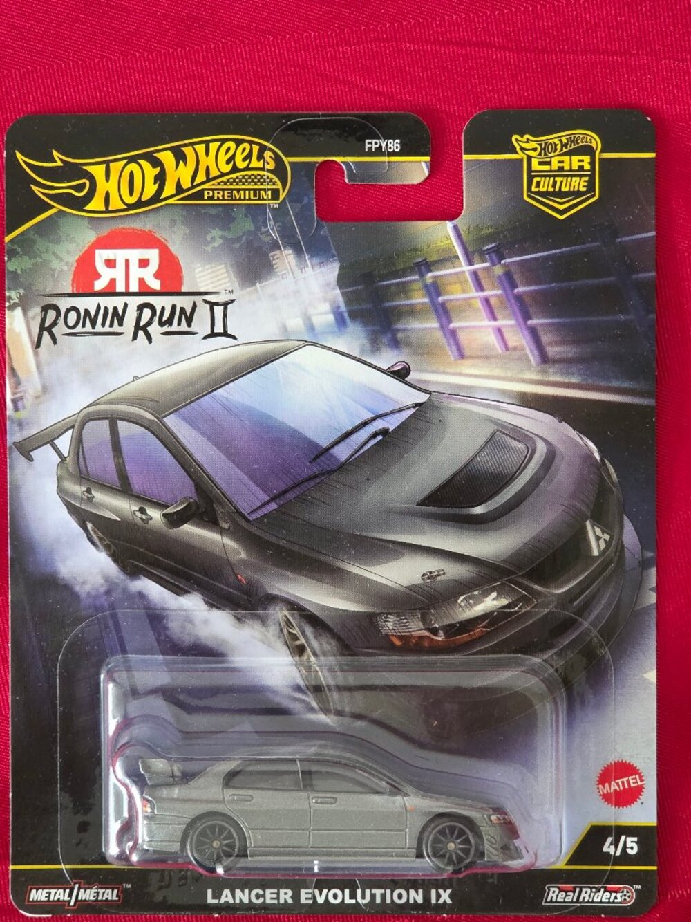2025 HOT WHEELS, PREMIUM REAL RIDERS, LANCER EVOLUTION IX, MINT IN THE PACKAGE!!